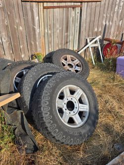 Set of 4 tires and wheels 8 lug for dodge trucks with caps $250 . Nerf bars $125 tailgate off of a 2012 dodge $100.