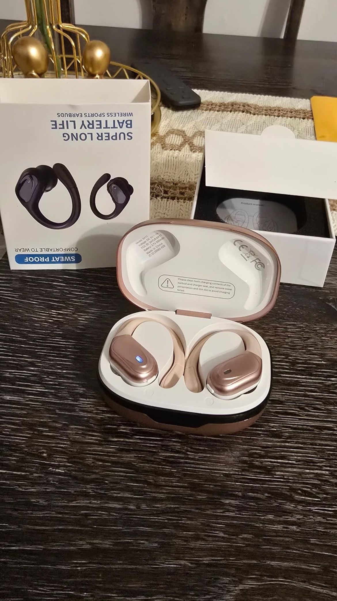 Pink and gold Bluetooth headphones
