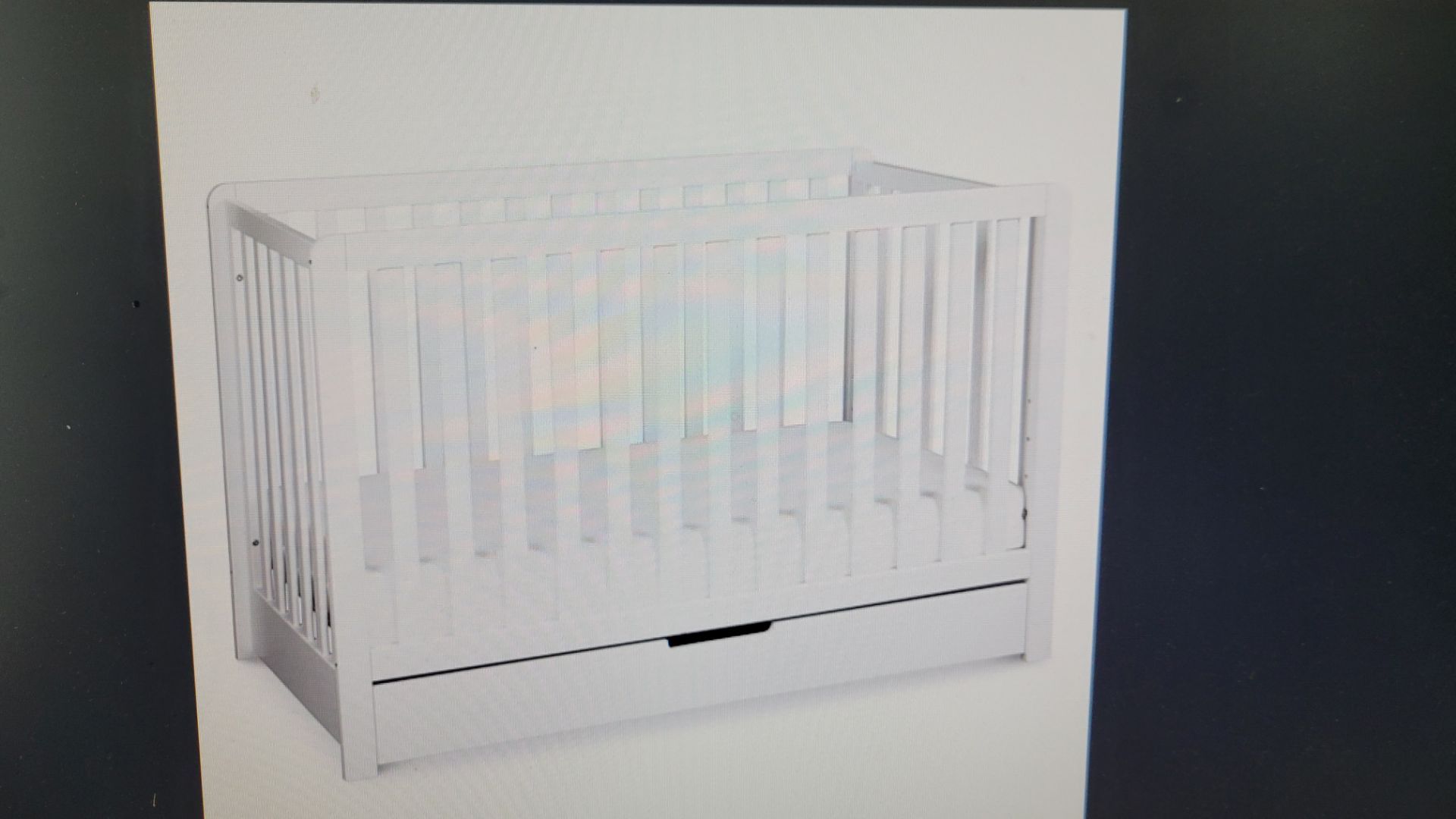 Convertible crib with storage drawer