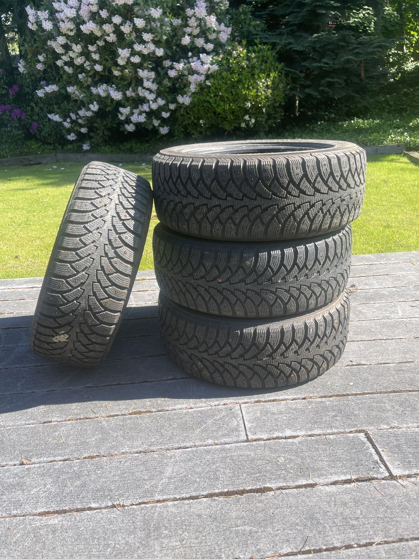 4 used 205/55R16 studded tires pick up only snow tires 