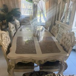 8 Chairs Dinner table and China cabinet