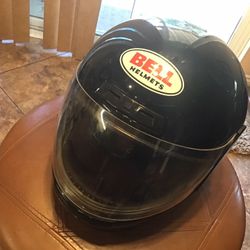 Bell motorcycle helmet sz 7 1/8. Black street moto snell