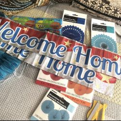 Variety Of Party Decorations And Welcome Home Banner
