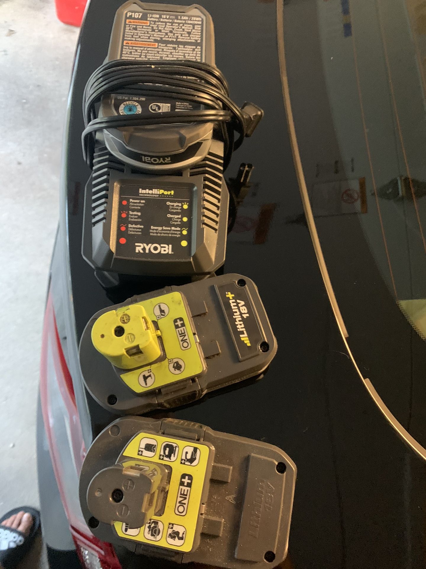 Ryobi charger and 2 batteries