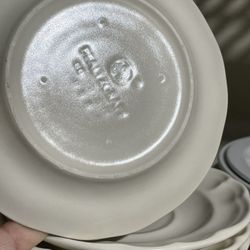 Eight Pfaltzgraff teacup saucers white