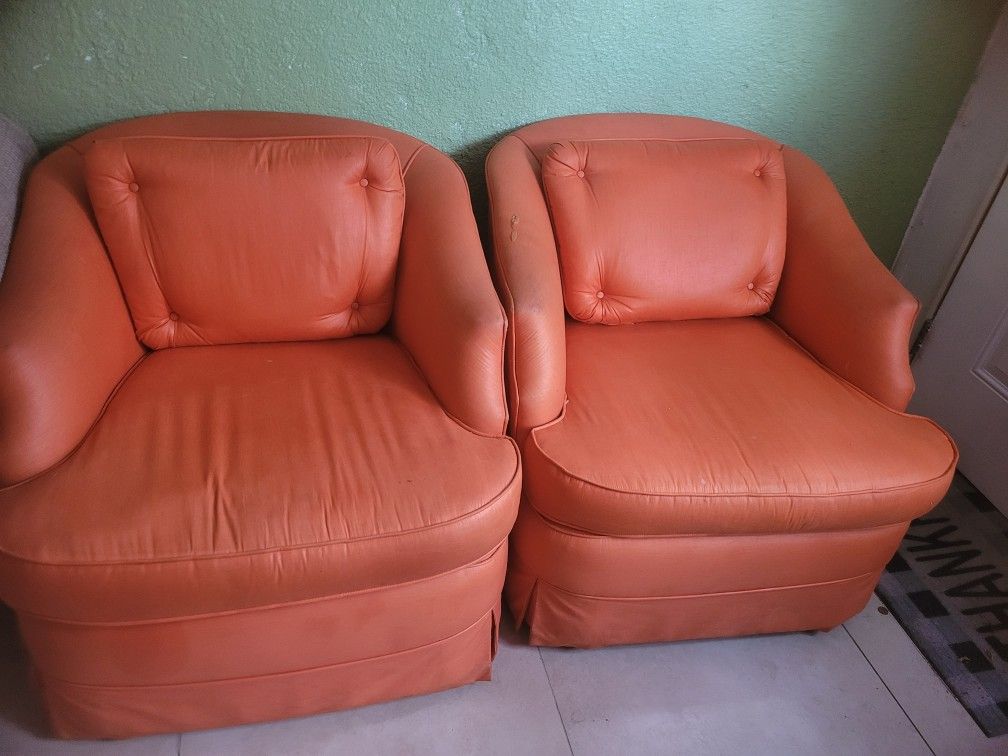 2 Orsnge Chairs