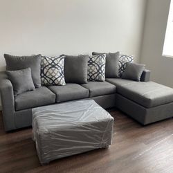 Grey Sectional With Ottoman !! New In Stock !!