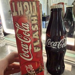 Vintage coca-cola flashlight bottle