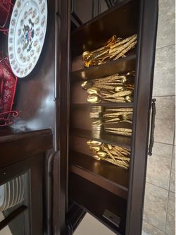 Gold silverware and dishes