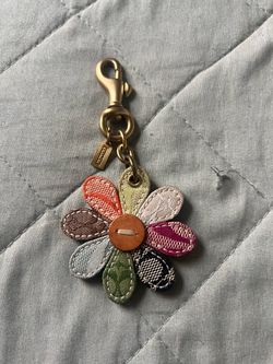 Coach flower charm