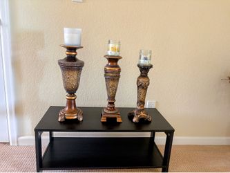 Set of three candle holders