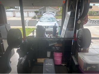 Home gym (bench, bar weights)