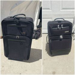 Suitcase On Wheels  - 2 Available $20 Each