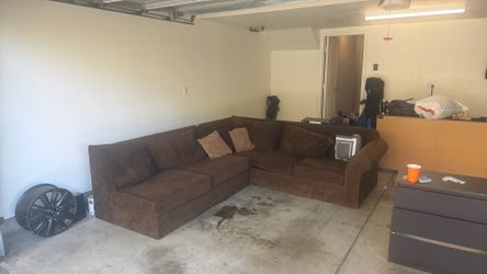 Used “L” shaped large brown couch
