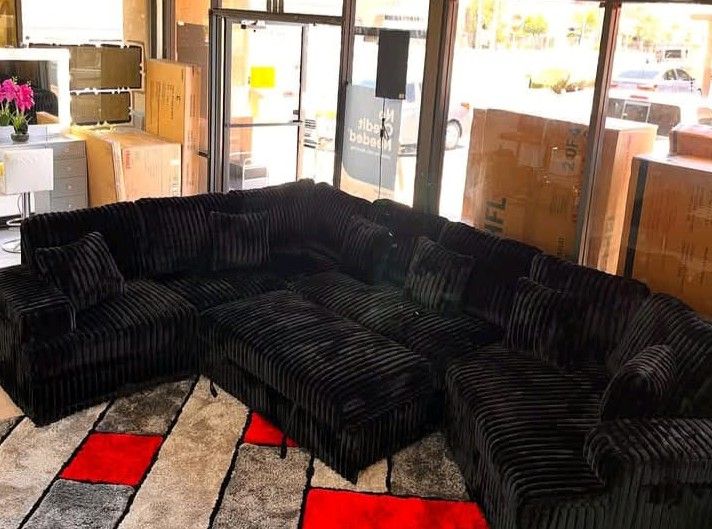 Black pull out sectional sofa with cuddler corduroy fabric