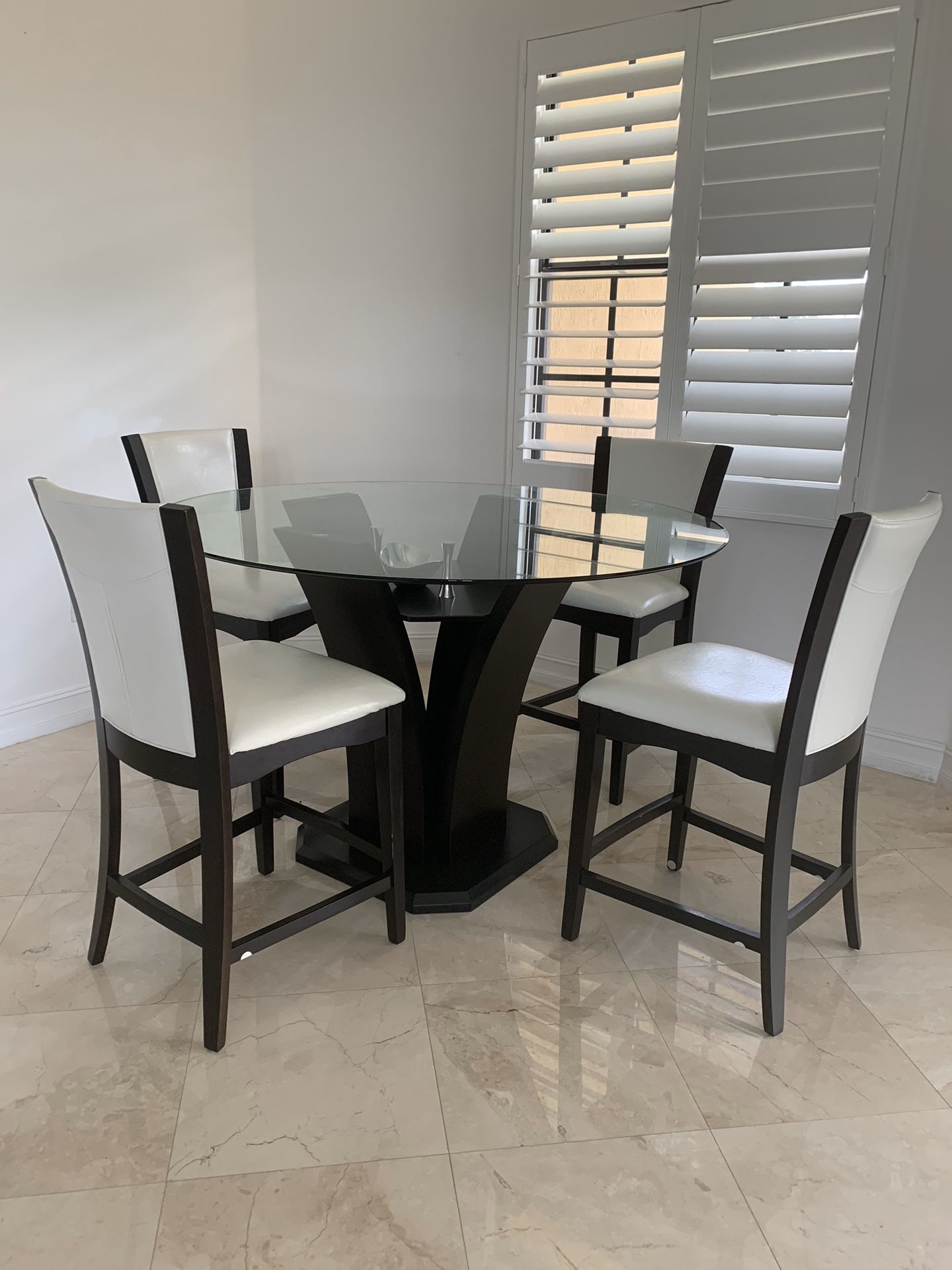 Modern breakfast table with Espresso Wood Base And peekaboo storage for