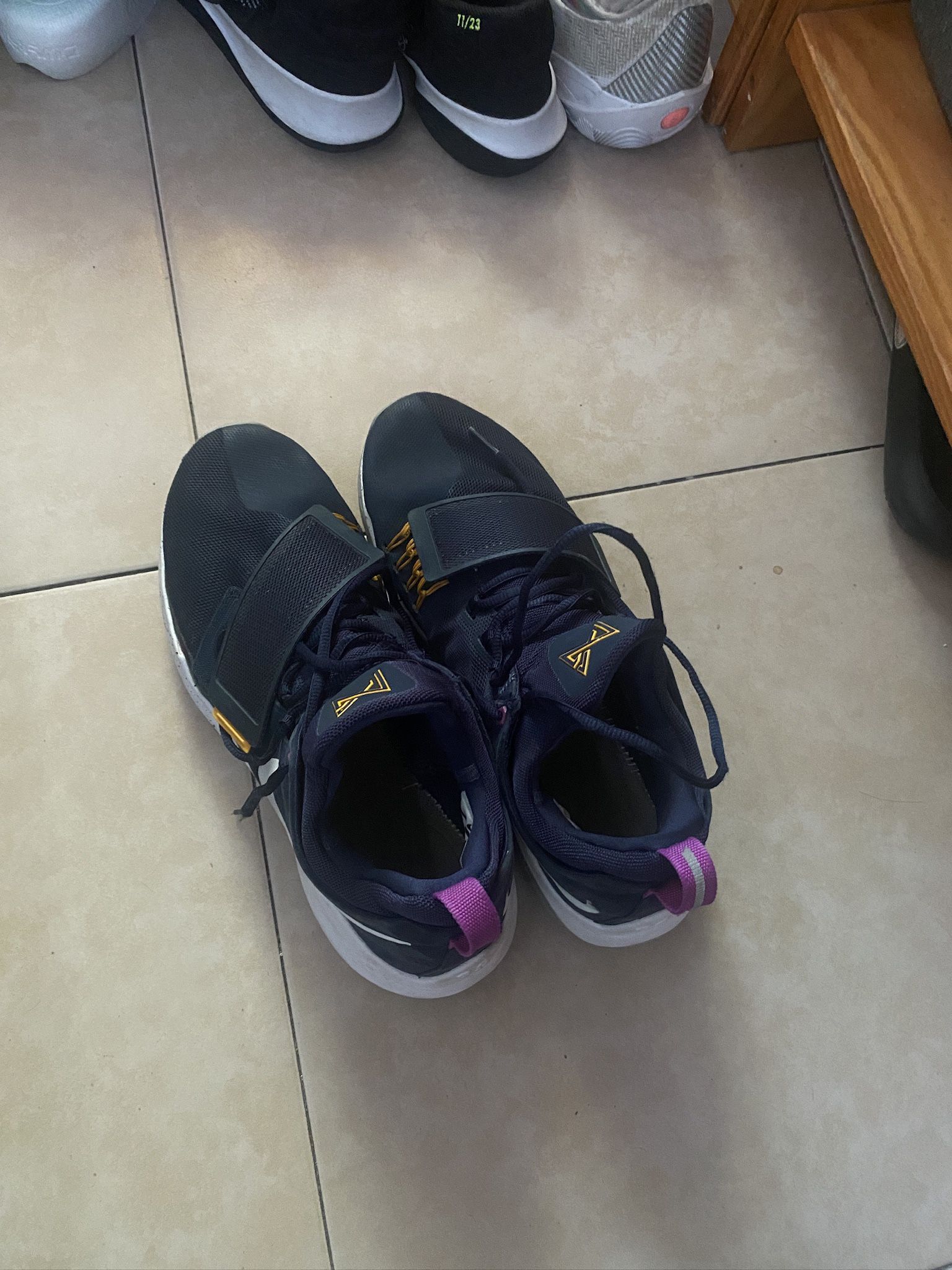 pg 1( Outsole on left shoe needs glue)