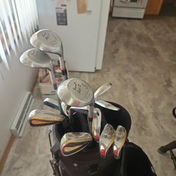 Golf Clubs And Bag With Balls