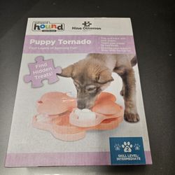 Nina Ottosson Dog Tornado is a level 2 treat puzzle dog toy