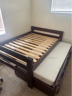 Full bed frame with twin trundle