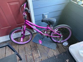 Pink children’s bike