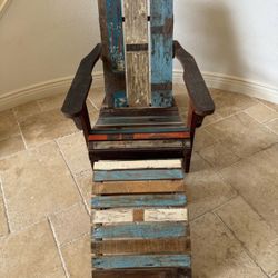 Selling a chair with a matching footstool for $250.