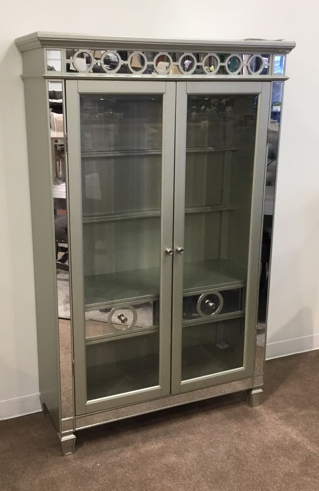 Two piece glass curio cabinet