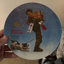 1981 Norman Rockwell plate “Wrapped Up In Christmas”