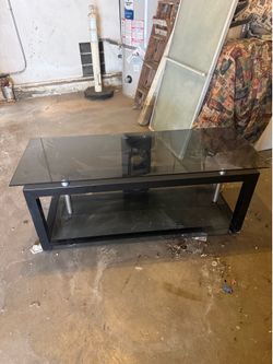 Black metal and glass entertainment stand