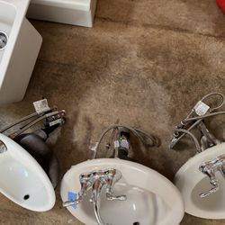 3 Small Sinks With Faucets
