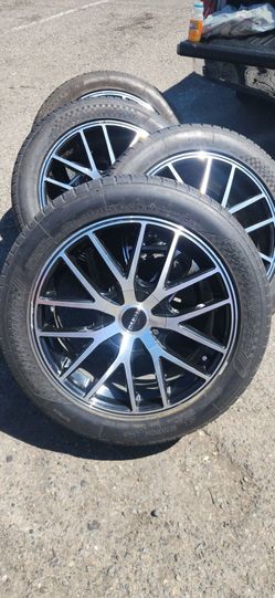 Set of 4 wheels with 255/45ZR18 tires; tires have 75% tread life remaining.....