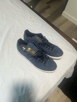 Blue adidas stan smiths