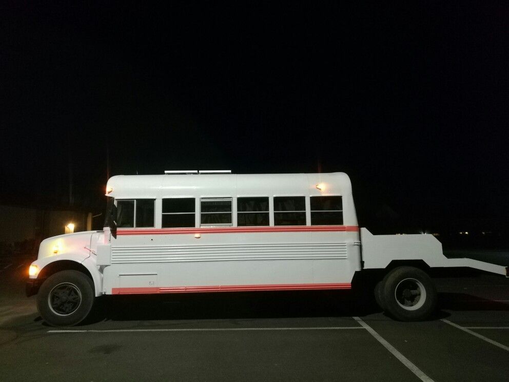Bus conversion toy hauler RV, diesel