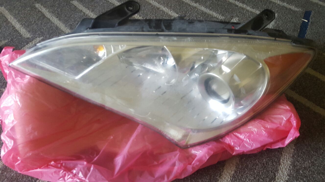 Genesis coupe 3.8 driver side headlight