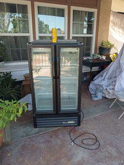 "True Refrigerator" model:GDM-30-HC-LD black 30 inches wide 54" in hight 23 and a half from front to back