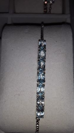 Blue Topaz bracelet set in Sterling silver.