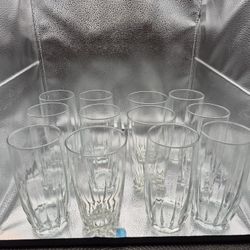 Set off (12) Twelve ounce clear glass high ball glasses