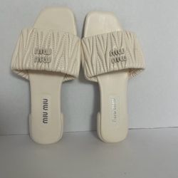 Miu Miu Matelassé nappa leather slides