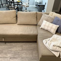 Beige Sectional Couch With Pull Out Ottoman 