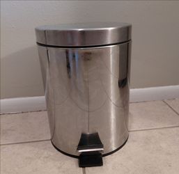 Small metal trash can