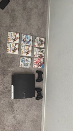 PS3 with 2 controllers and games