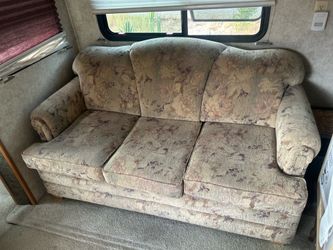 Free Rv couch, pull out bed , and table and chairs