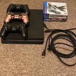 PS4 with Games and 3 Controllers 