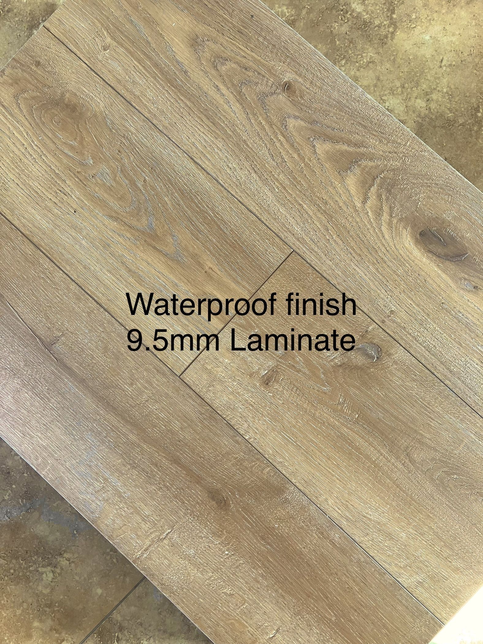 BLACK CORE 9.5 MM LAMINATE FLOORING WITH WATERPROOF FINISH FOR UP TO 360 HOURS OF PROTECTION. PAD ATTACHED AND EASY TO INSTALL. AC4 COMMERCIAL RATED