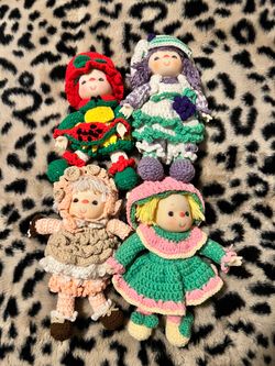 vintage 1980s hand-crocheted Strawberry Shortcake and friend dolls