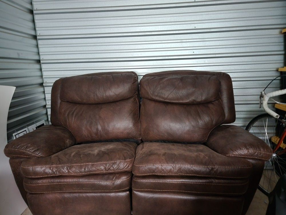 Love Seat with fold-out foot rests