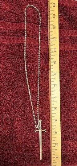 FREE Sword Necklace with a purchase. Pick-up In Aurora.