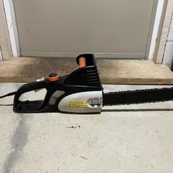Remington Electric Chainsaw, 16” bar. (Model 107624-01)