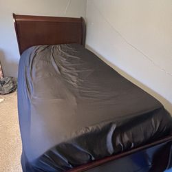 Sturdy Wooden Twin Sleigh Bed