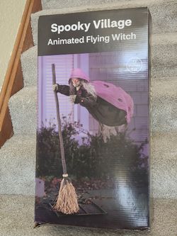 Antimated flying witch 72 inches tall Halloween Decoration